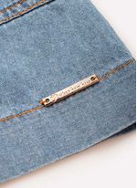 Jardineira_Jeans_Bolsos